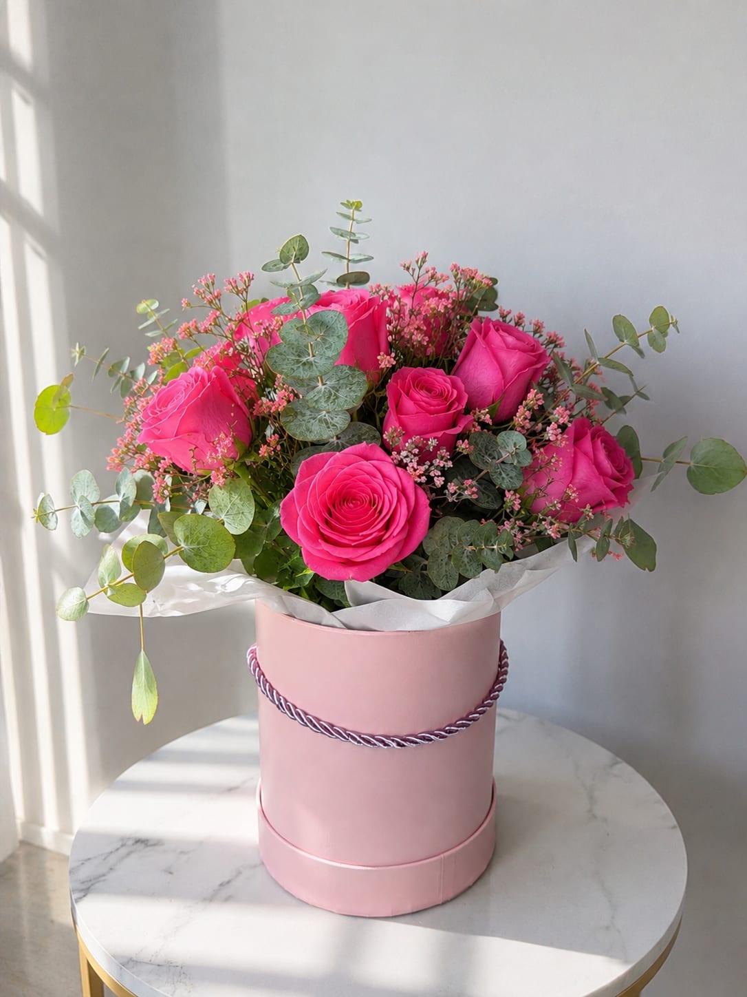 Pink Bloom box - Mother’s Day Pink Rose Hat Box | Same-Day Flower Delivery in Myrtle Beach. Elegant hot pink roses arranged in a luxury hat box with fresh eucalyptus and seasonal blooms. Perfect for Mother’s Day, birthdays, and special occasions. Same-day flower delivery available in Myrtle Beach when ordered before 12 PM.