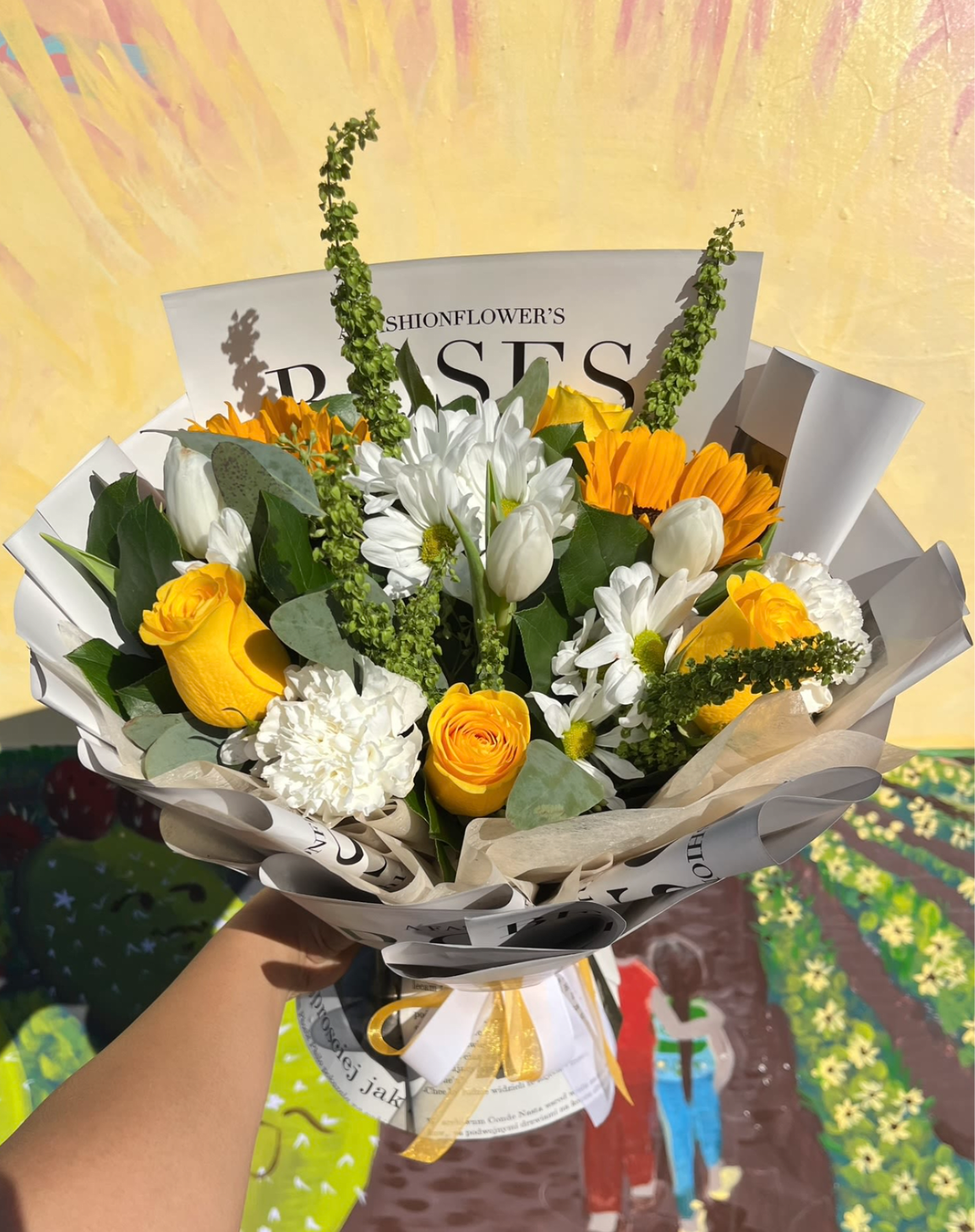 Small Korean Yellow Rose Bouquet - A petite yellow rose bouquet with white tulips, daisies, carnations, and bells of Ireland to give a beautiful, full, and stunning look.