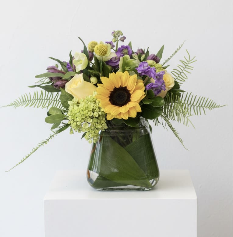 See You Smile - Sunflowers are accented with purple and green blooms