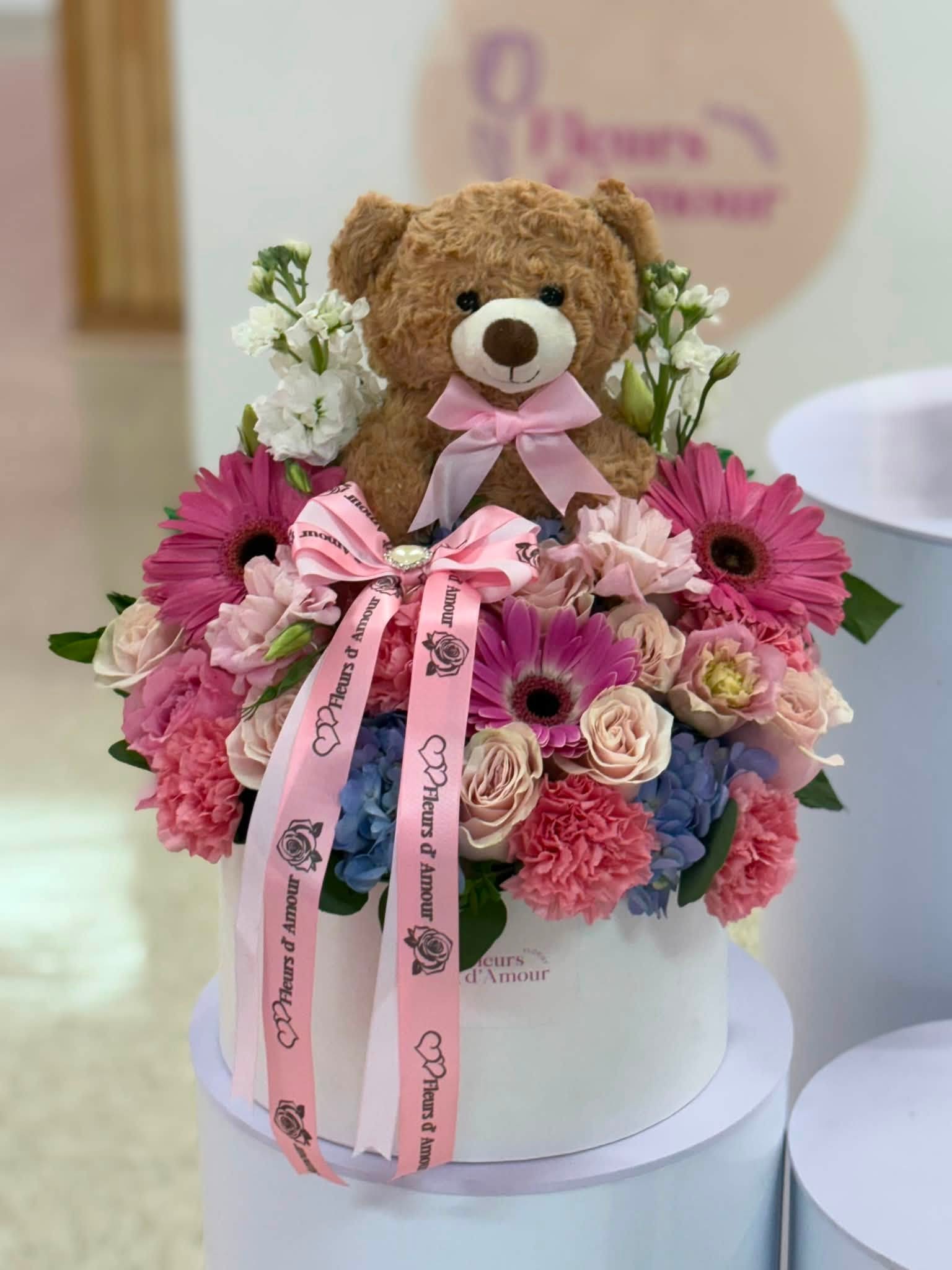 teddy box - roses, carnations and gerberas with a teddy