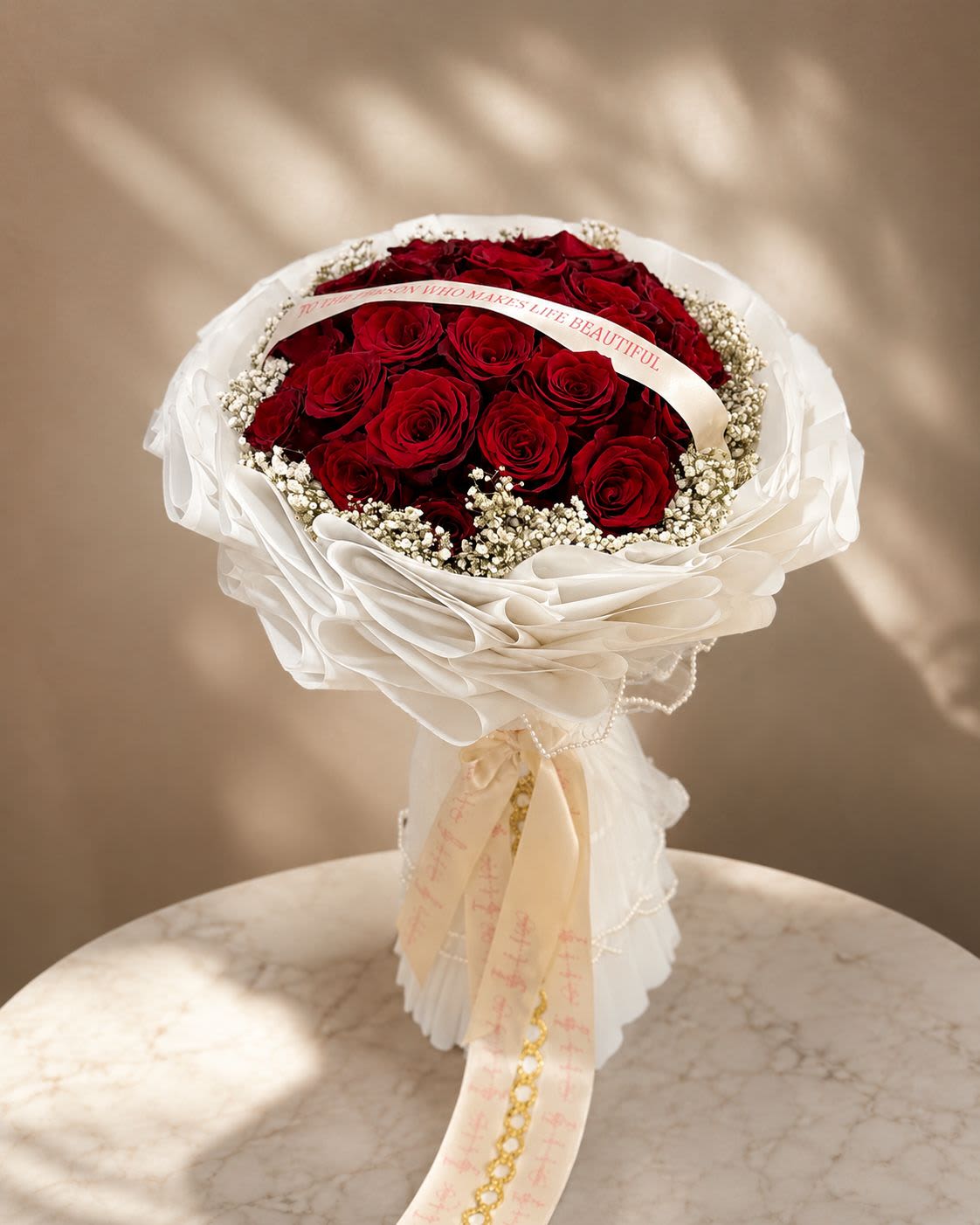 Scarlet Romance Deluxe Couture Bouquet - An elevated version of our classic red rose bouquet featuring luxurious layered wrapping, premium Ecuador roses, baby’s breath, and couture ribbon detailing.  Designed for customers who want something truly unforgettable.  Includes: ️ Premium Long-Stem Roses ️ Elegant Korean Wrap ️ Luxury Ribbon Finish ️ Fresh Baby’s Breath