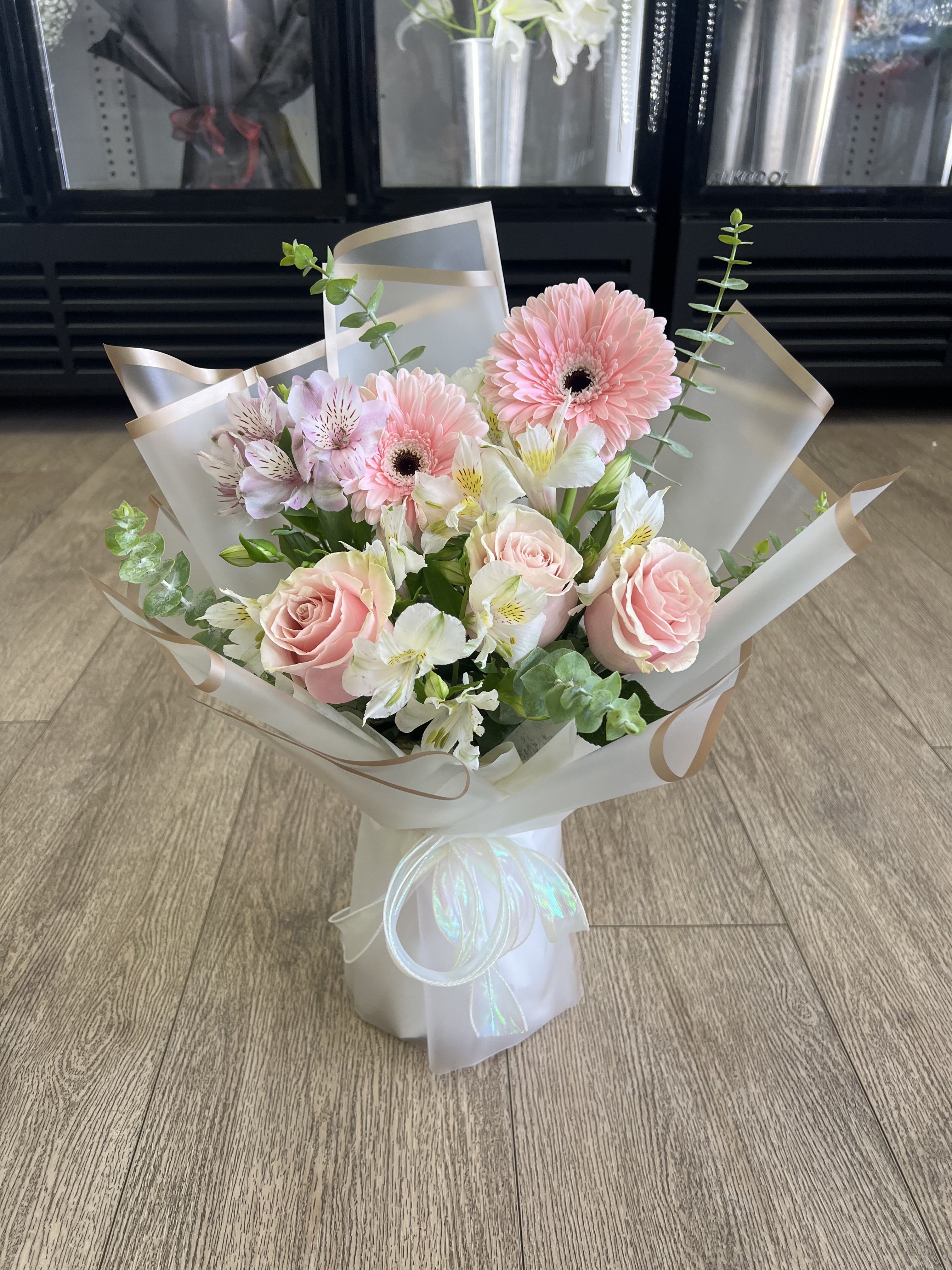 Flowers for you bouquet  - Pink daisies, roses and white alstroemeria in a rounded bouquet, wrapped in white paper with a pale satin ribbon-gentle, romantic gift for birthdays, anniversaries or thanks.