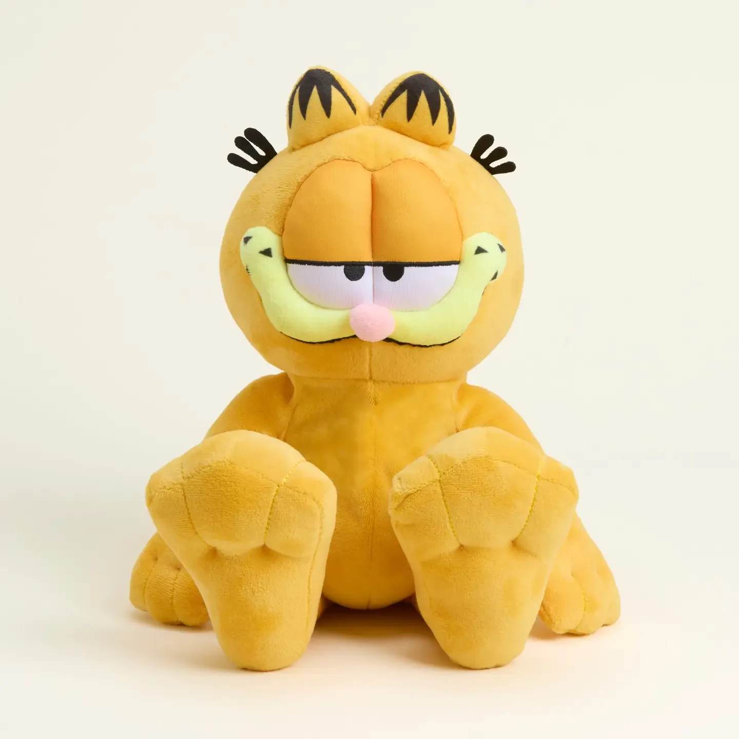 Garfield Warmie - Warmies® are fully microwavable to provide hours of soothing warmth and comfort. These adorable soft toys are scented with real dried French lavender and perfectly weighted for a positive sensory experience. Warmies make an ideal gift for all ages!