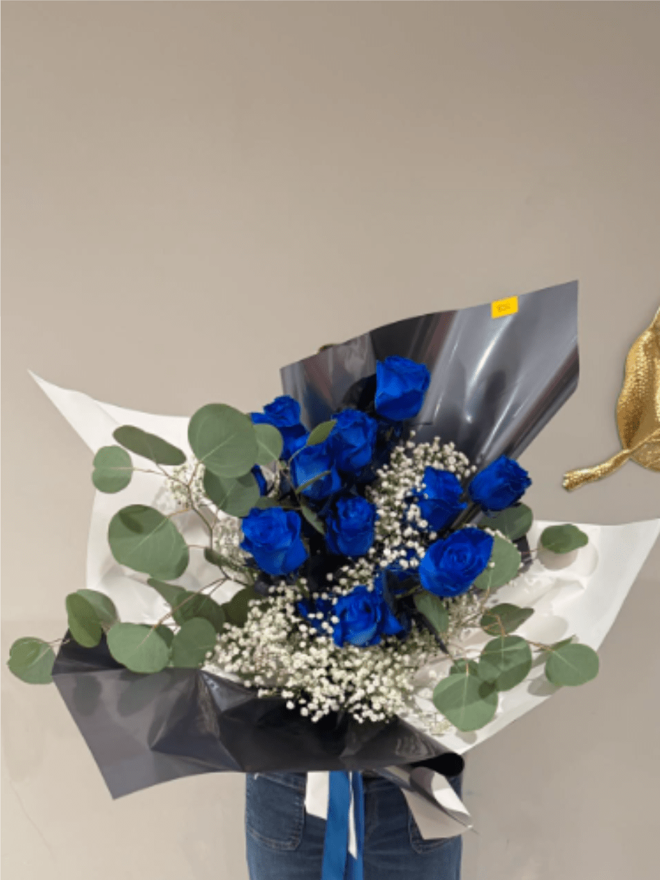 Blue Elegance Bouquet - A stunning bouquet featuring premium roses, delicate baby’s breath, and fresh eucalyptus, beautifully wrapped for a luxurious presentation. Perfect for birthdays, anniversaries, celebrations, or simply making someone’s day unforgettable.   Color of the roses can be customized to your preference, subject to availability.