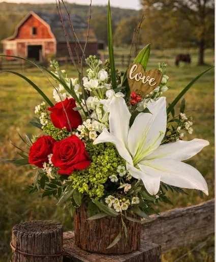 Woodland Sprite Floral Arrangement - A whimsical bouquet as if gathered by Fairies at dawn - Petals blushing with secret magic, stems whispering old forest songs. It looks like the kind of flowers that might glow softly at twilight and grant a single, gentle wish if admired long enough.