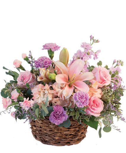 Pretty with Pinks Basket Arrangement - Bring a pink lover's dream to life with this stunning basket! Filled with gorgeous light pink lilies, lavender carnations, light pink roses, lavender stock, and so much more, Pretty with Pinks is a delightfully fragrant mix. Send the special people in your life this sweet basket today!  Includes: Basket , Greens: Salal , Silverdollar Eucalyptus , Variegated Pittosporum , Flowers: Lavender Carnations , Light Pink Roses , Light Pink Mini Carnations , Lavender Stock , Pink Hydrangea , Light Pink Lilies , Purple Caspia.
