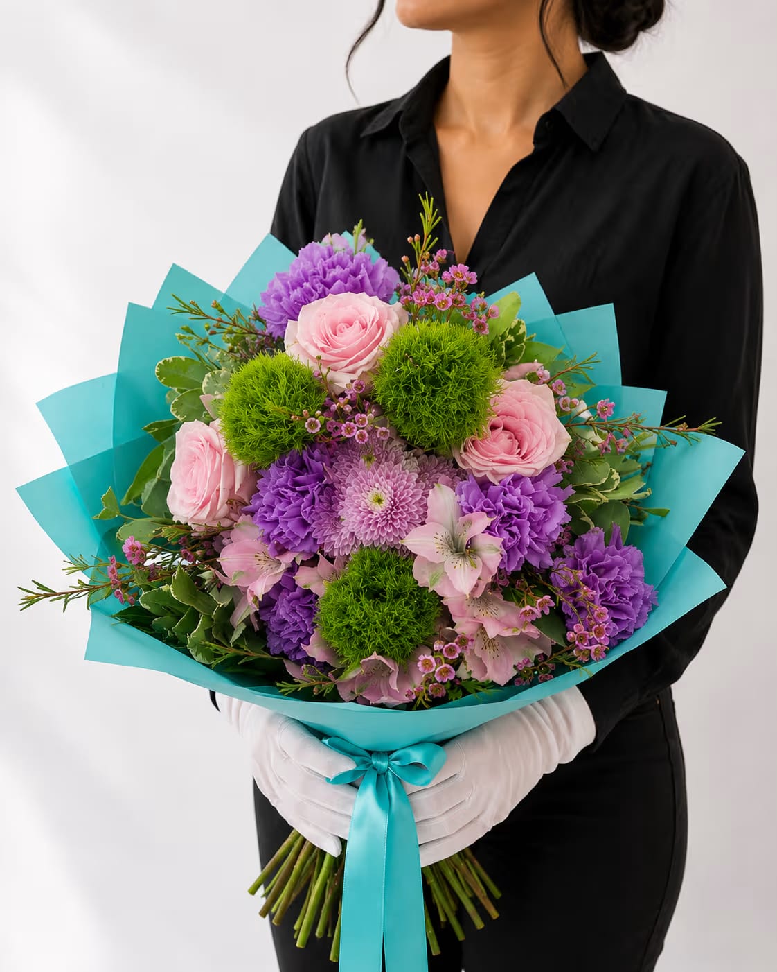 Celeste Bouquet (V Signature™) - Celeste exclusively designed and sold by Velvet Stems™ is a graceful hand-tied bouquet wrapped to perfection. Soft lavender blooms, blush pink roses, and airy green accents come together in a fresh, whimsical palette that feels both elegant and uplifting. Designed for effortless gifting, this bouquet wrap is a radiant gesture of charm, beauty, and timeless grace.