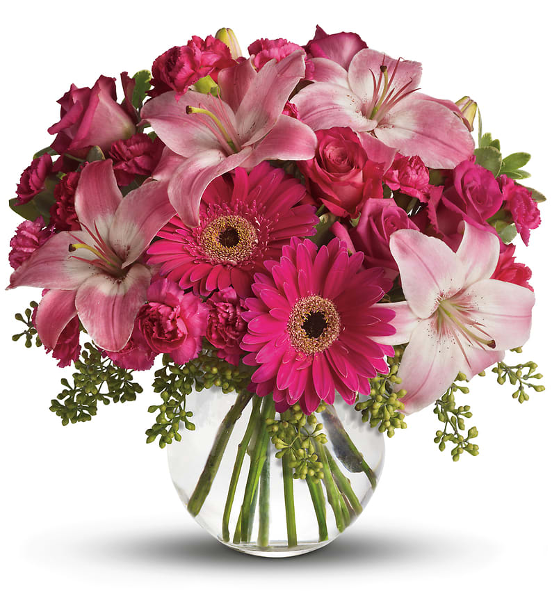 A Little Pink Me Up - Sometimes all she needs is a little pink me up! An ideal pick for anyone whose favorite color is pink, this stylish mix is full of variety and comes presented in a clear glass bubble bowl she'll use again and again.  A wide variety of flowers including pink roses, pink asiatic lilies, hot pink gerberas, pink carnations and hot pink miniature carnations are mixed with fresh variegated pittosporum and seeded eucalyptus. Presented in a gorgeous glass bubble bowl. 