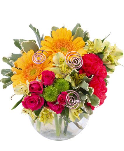 Fiery Pink Floral Design - This bouquet is full of heat! Featuring a hot mix of yellow gerberas, hot pink carnations, spray roses, and more, Fiery Pink will light up a room and bring warmth to those who receive it. Send someone you love this exquisite bouquet today!  Includes: Bubble Bowl, Decorative, Greens: Variegated Pittosporum, Flowers: Greenyellow Alstroemeria, Yellow Gerberas, Hot Pink Carnations, Hot Pink Spray Roses, Green Button Poms.
