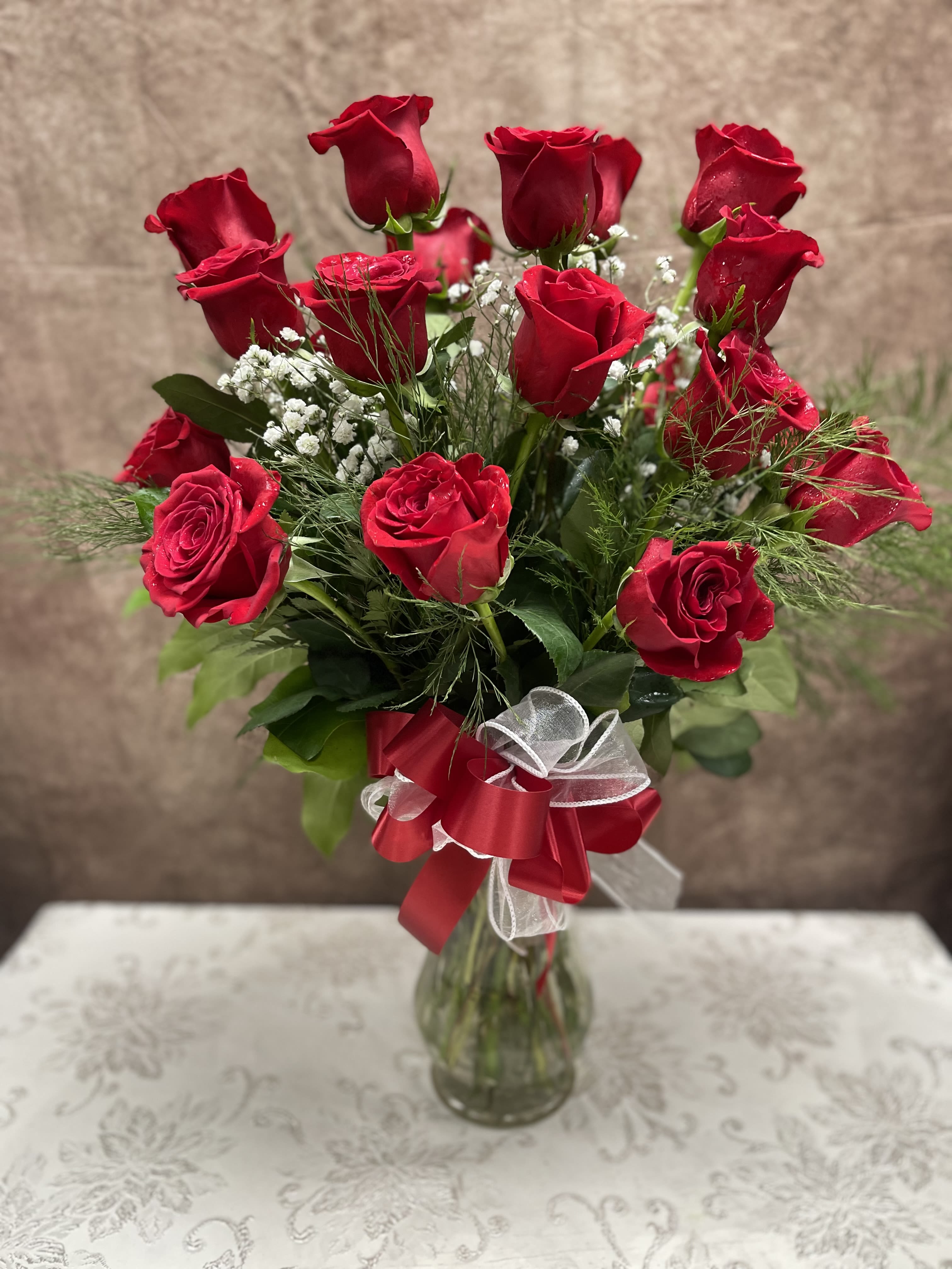 Roses Vased - Any color - Roses in a vase with complimentary filler and greens.