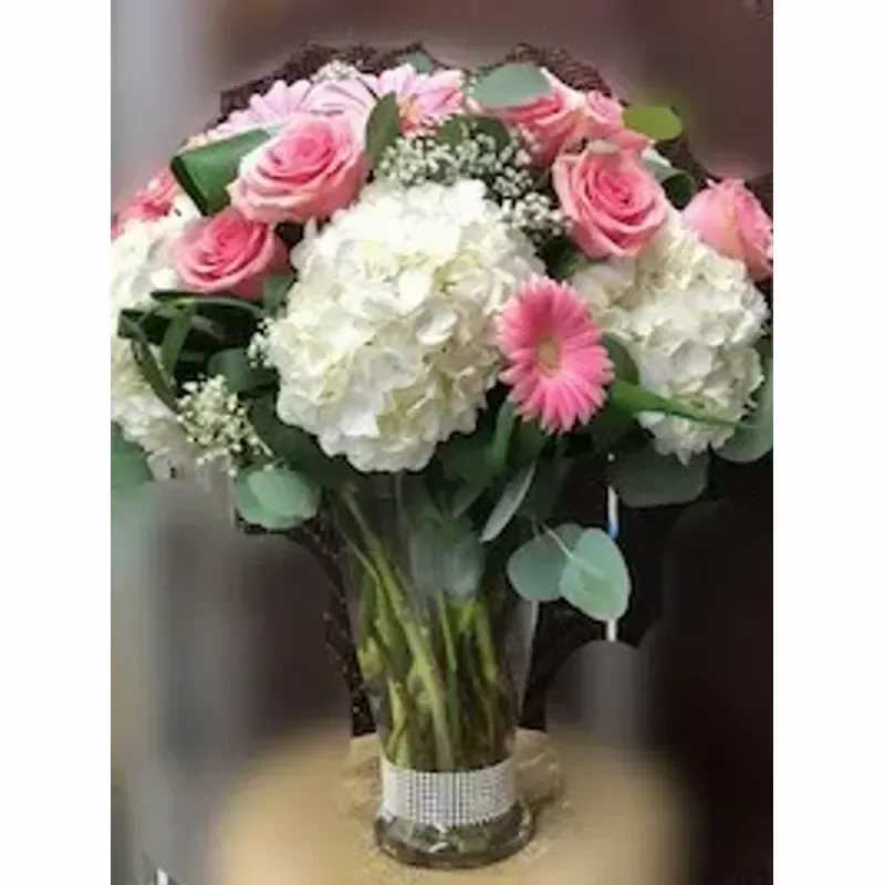 Pink Pursuits Bouquet - Lush Mixed Flowers Arranged In A Large Glass Vase. 