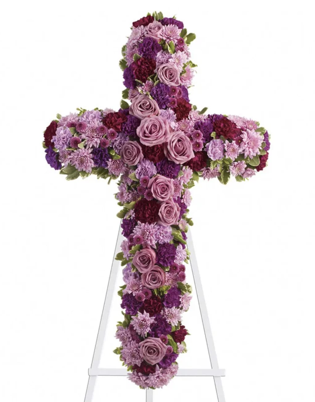 Purple and pink floral cross on a white easel