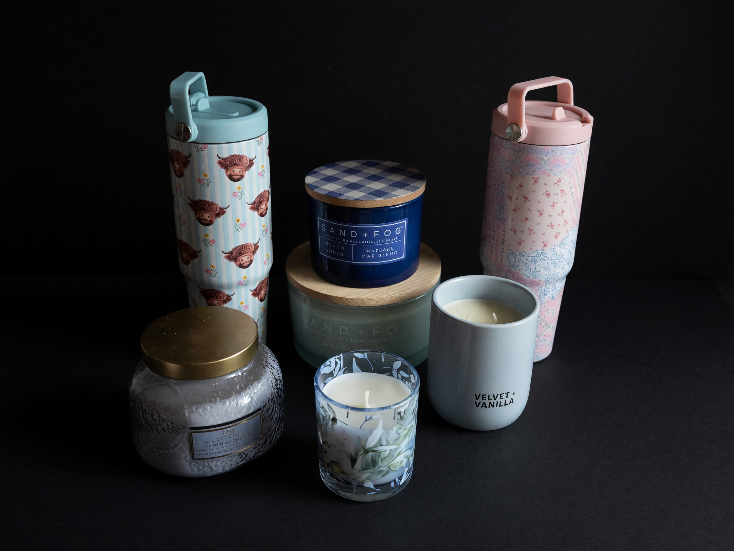 Boutique Candles &amp; Gift Collection - Sand + Fog Candle – $19.99 Textured Glass Candle – $19.99 Floral Glass Candle – $19.99 Velvet Vanilla Candle – $19.99 Patterned Tumblers – Prices Vary