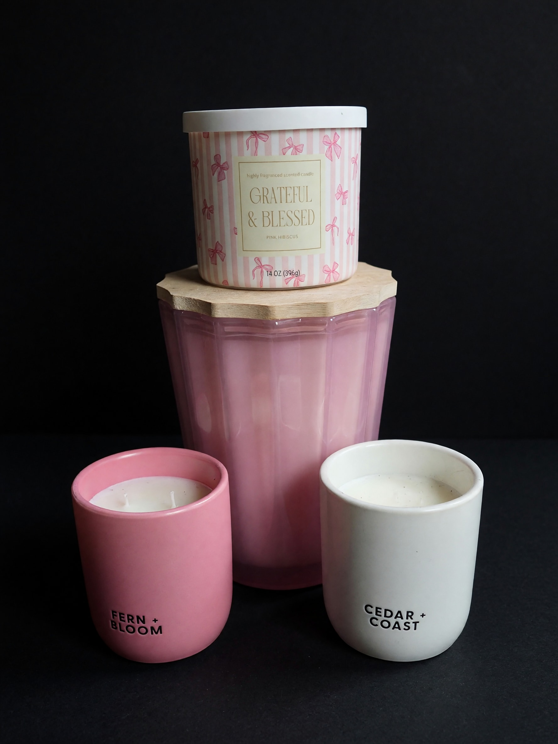 Signature Candle Collection - Available Scents &amp; Prices  Island Blossom (Large Sand + Fog Candle) – $45.99 Gracefully Blessed Candle – $19.99 Fern Bloom Candle – $19.99 Cedar Coast Candle – $19.99