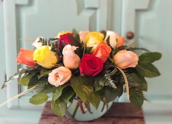 Rosie Posie - Lovely mix of assorted roses arranged in an elegant bubble bowl. Colors may vary