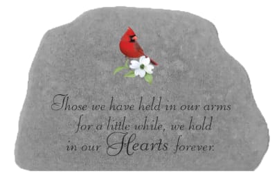 Gray memorial stone with a red cardinal and white flower engraving