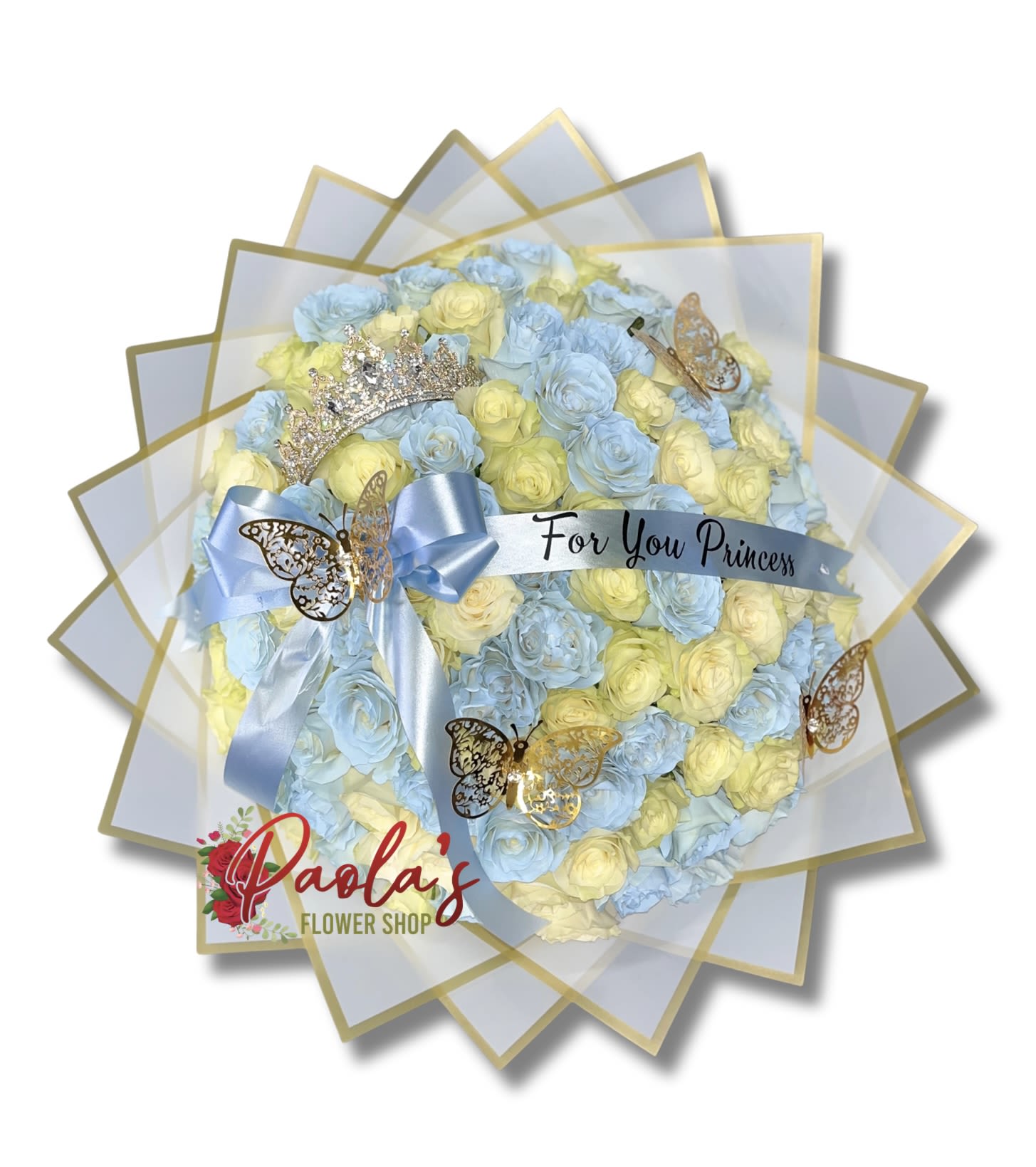 Bouquet of blue and yellow roses with a ribbon and butterfly decorations