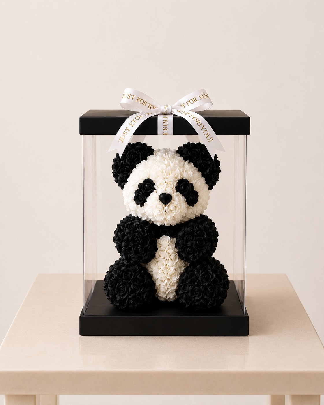 Rose Panda Bear in a Box - A charming panda bear handcrafted from black and white rose florals, beautifully wrapped in a box , A unique and lasting holiday gift, perfect for making the season extra special. If you want it shorter, cuter, or more luxury-focused, I can adjust it instantly.