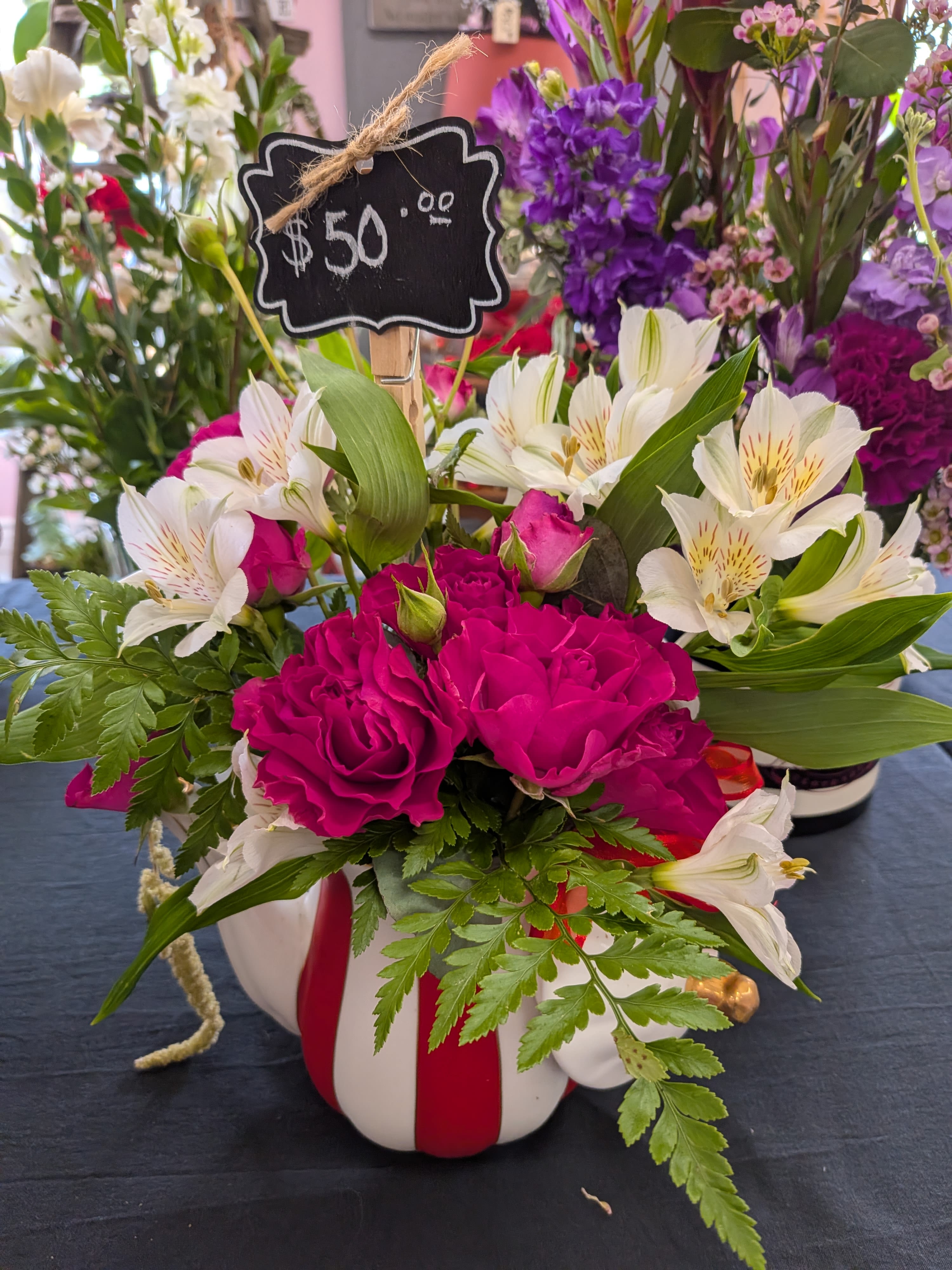 Tea time and blooms - Little tea pot short and spout, full of colorful flowers.