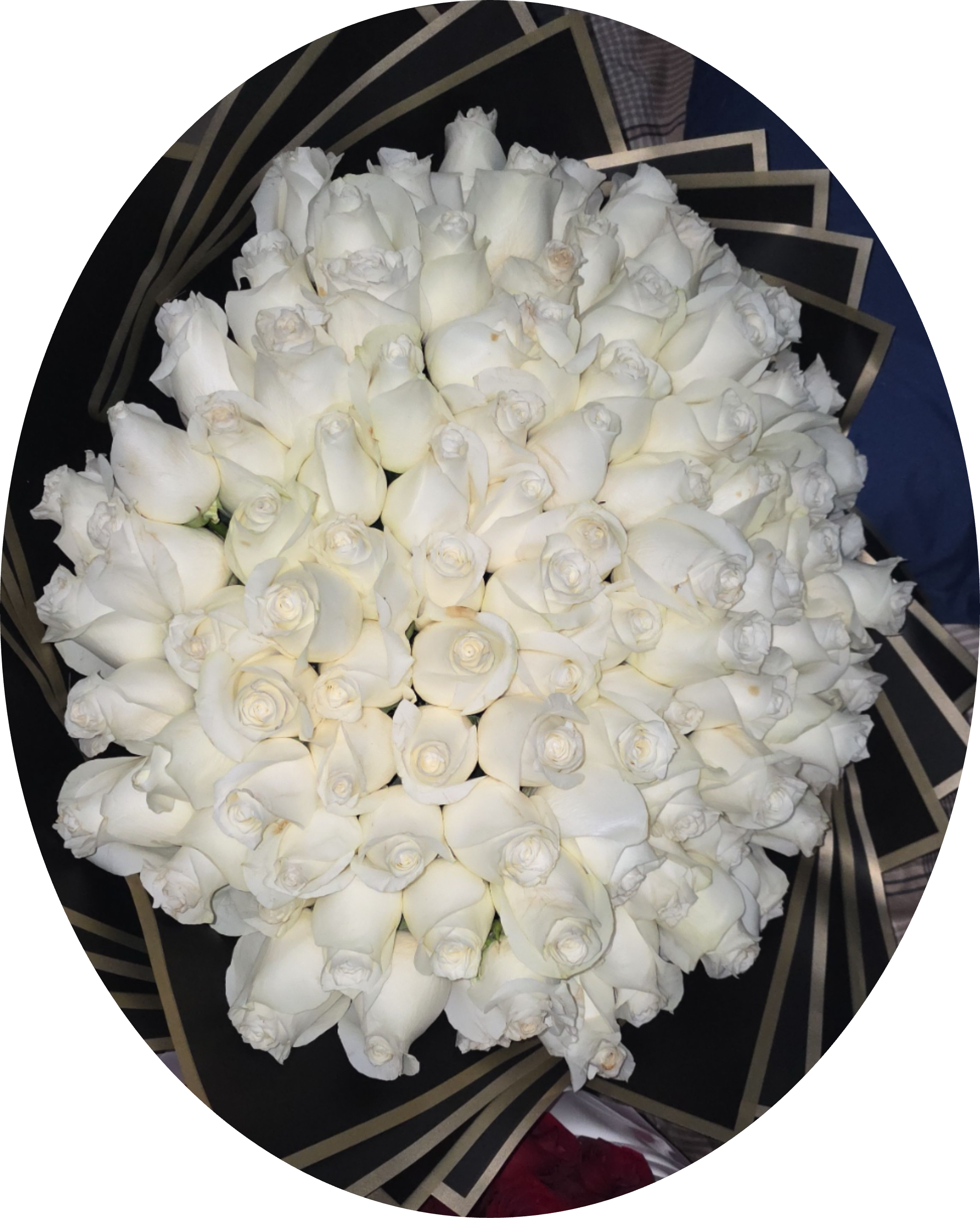 100Snow White - A dramatic dome of tightly packed roses makes a bold statement for romantic occasions and grand celebrations-this large rose bouquet is perfect as an anniversary roses gift or a Valentine's Day bouquet to make the person you're thinking of feel deeply adored. The dense, velvety arrangement reads as luxurious and formal whether rendered in deep red for passionate romance or pristine white for an elegant wedding bouquet or sympathy arrangement.  Each version features many roses arranged in a rounded, cloudlike mass with blooms at slightly varied stages of opening for natural texture and lasting presence. The red option is framed in crisp white paper wrapping that heightens the color contrast and drama; the white options are wrapped in layered black paper with gold trim for a refined, high-contrast finish. A decorative bouquet wrap and protective paper sleeve complete the presentation.  This is the kind of bouquet that reads as thoughtful and unmistakable-she'll feel truly celebrated when presented with it. Available in a large size; the dense packing helps the arrangement maintain shape and bloom fullness for several days-keep in fresh, cool water and trim stems on arrival for best results.