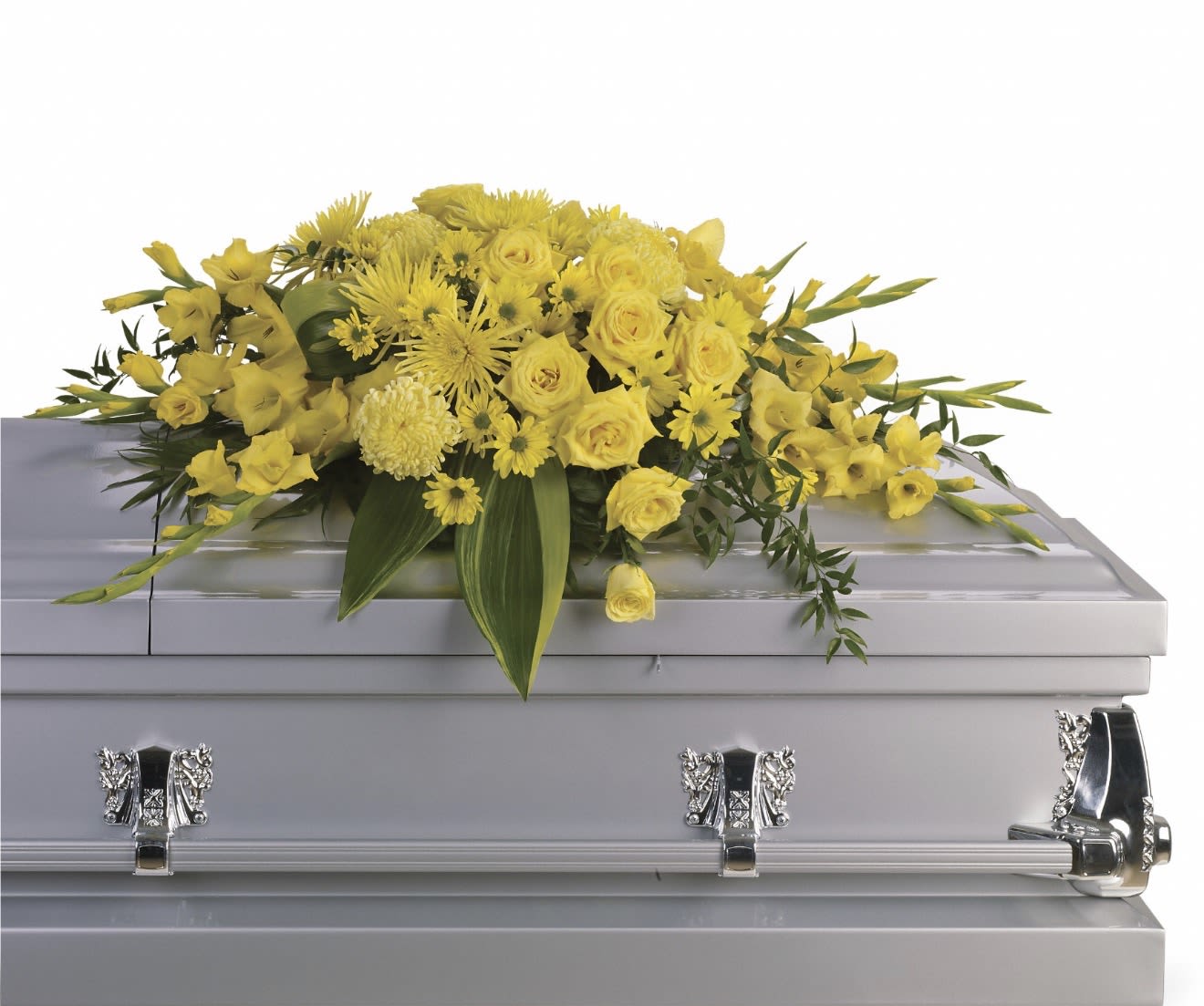 Graceful Grandeur Casket Spray - A luminous, all-yellow casket spray that brings warmth and uplifting presence to a funeral or memorial service, designed to honor and celebrate a life. This funeral flower arrangement features clustered roses, daisy-like blooms, lush chrysanthemums and delicate alstroemeria arranged in a dense, rounded composition that drapes gracefully across the top of the casket. The compact, formal profile and thoughtful accents give the piece a respectful, comforting expression for saying goodbye.  Textured layers of full chrysanthemum forms and soft roses are balanced with cheerful daisy shapes and spidery alstroemeria, while a few long, arching stems add gentle movement and visual flow. Sized to cover the casket top with a dignified silhouette, this spray is crafted for sympathy and memorial services as a meaningful tribute the person you're honoring will be remembered by. Arrangements are delivered ready to place and have been designed to maintain freshness through the service.