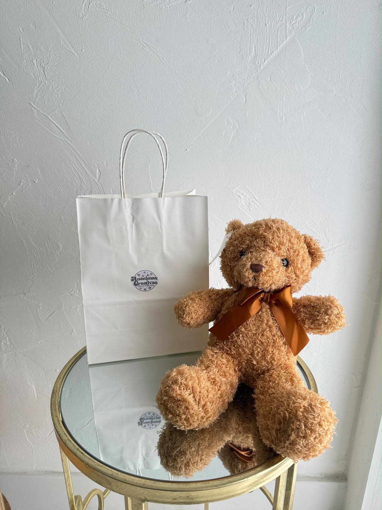 Plush Teddy Bear - Complete your gift with our adorable Plush Teddy Bear, the perfect keepsake to express love, comfort, and affection. Made from ultra-soft premium plush and finished with an elegant satin bow, this cuddly teddy bear is a thoughtful addition to any floral arrangement, balloon bouquet, or gift basket.  Ideal for birthdays, anniversaries, Valentine’s Day, baby showers, get well wishes, sympathy gifts, or simply to make someone smile. Its timeless design makes it a cherished gift for both children and adults. Perfect For:  * Birthday Gifts * Anniversary Gifts * Valentine’s Day * Get Well Soon * New Baby Gifts * Sympathy &amp; Comfort * Just Because  Features:  * Ultra-soft premium plush * Elegant satin ribbon bow * High-quality craftsmanship * Perfect add-on to flowers, balloons, or gift baskets * Great for all ages