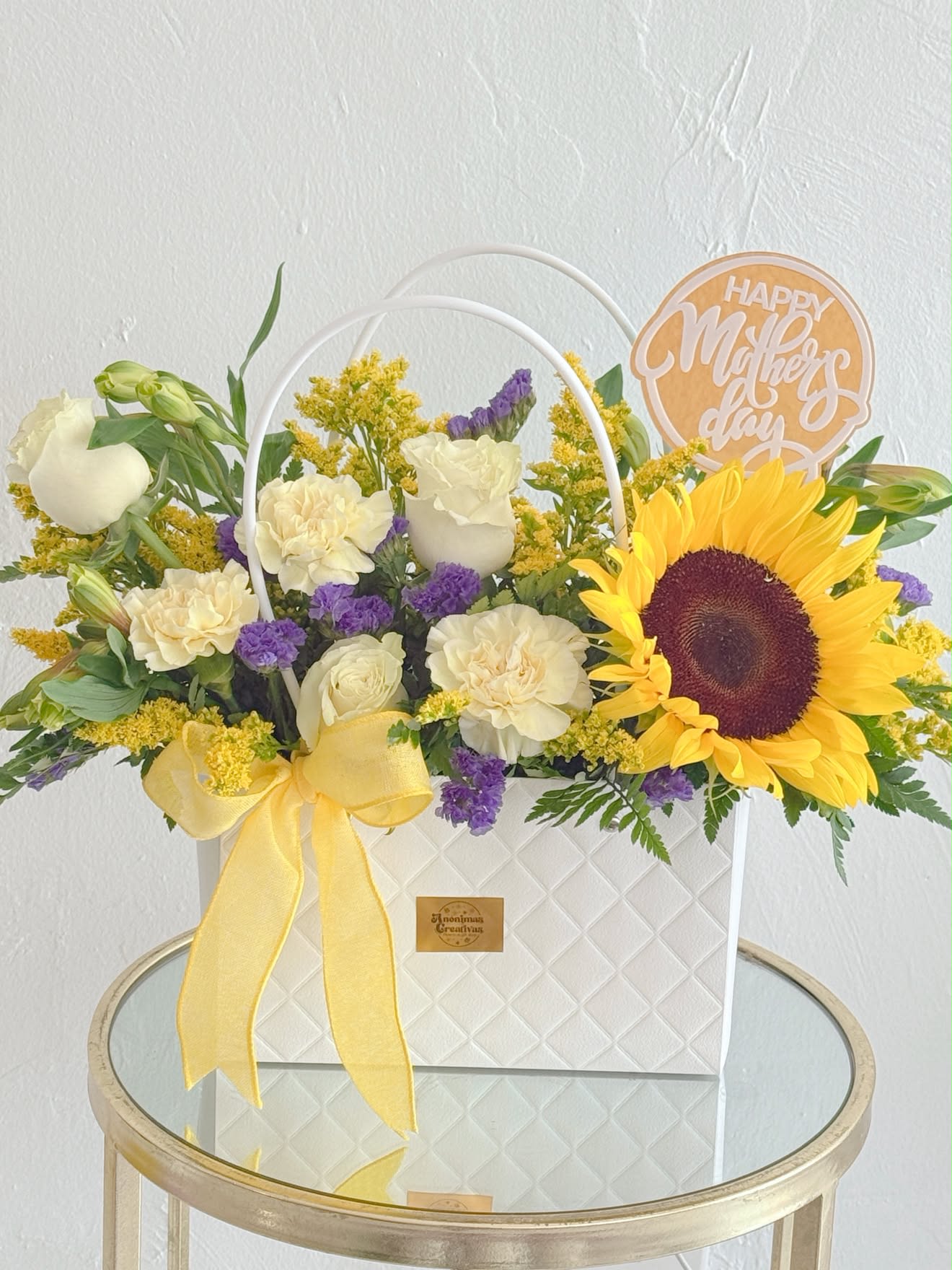 Flower Bag Sun - Floral handbag overflowing with roses and eucalyptus.