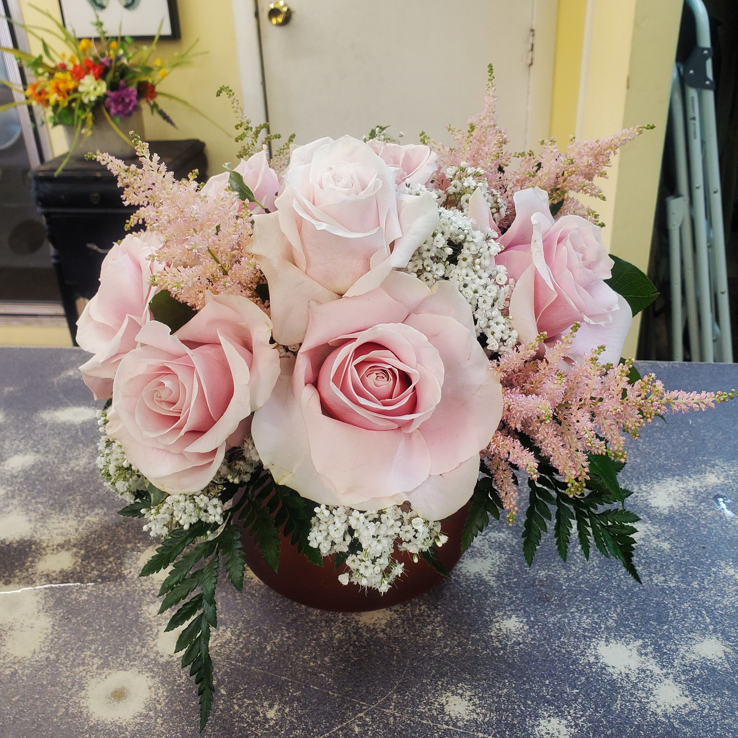  Rose Bunch Bouquet { PINK ONLY } - A compact glass vase filled with large opened PINK  roses,  a variety of greens and fill.  **NO COLOR SUBSTITUTIONS...THIS ARRANGEMENT IS AVAILABLE IN PINK ONLY**