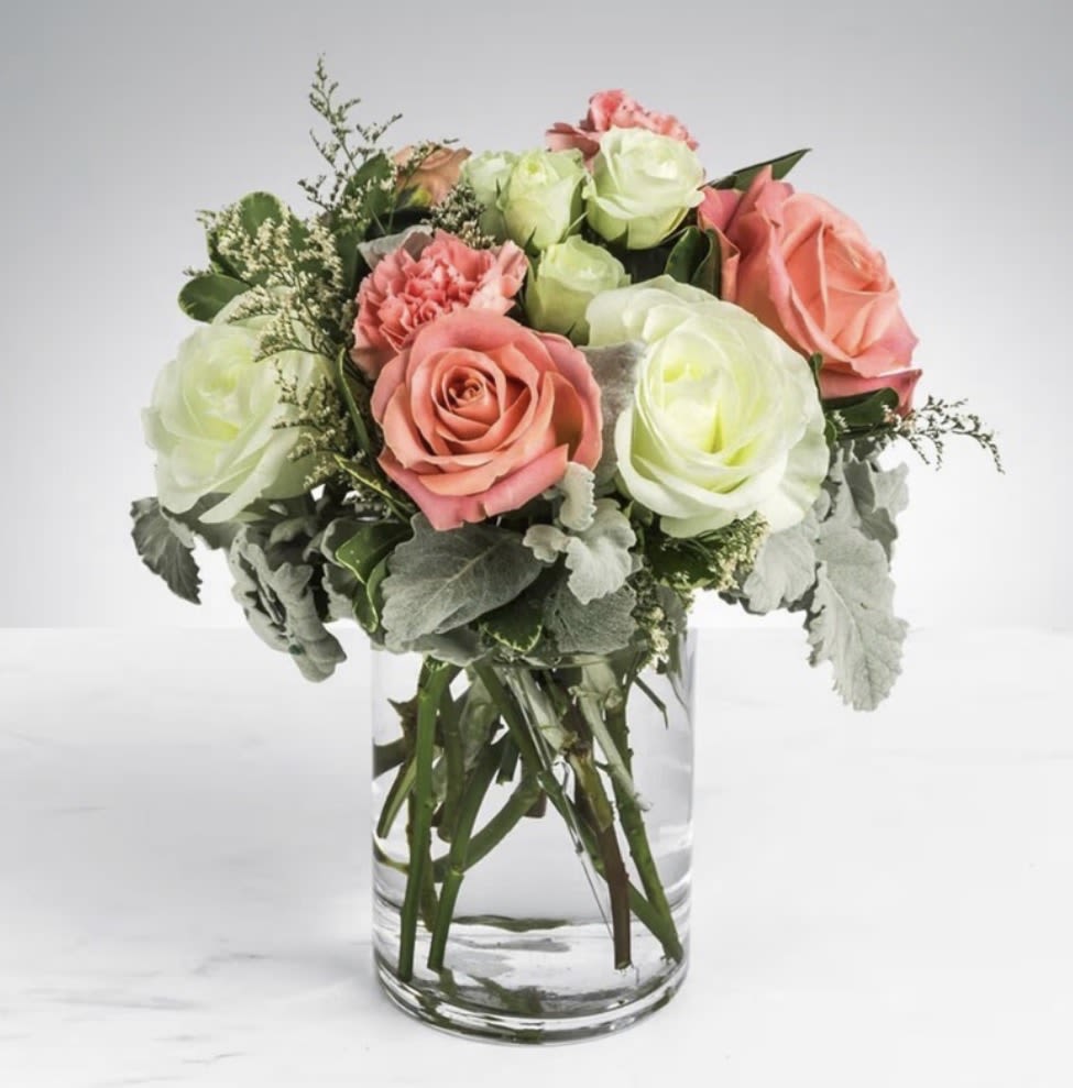 Sweet &amp; Subtle  - This arrangement includes pink roses, white roses, white spray roses, pink carnations, and dusty miller. Sweet &amp; Subtle by BloomNation™ is the perfect gift for a birthday, thank you, or just because.  Disclaimer: Flowers may be substituted if needed to. 