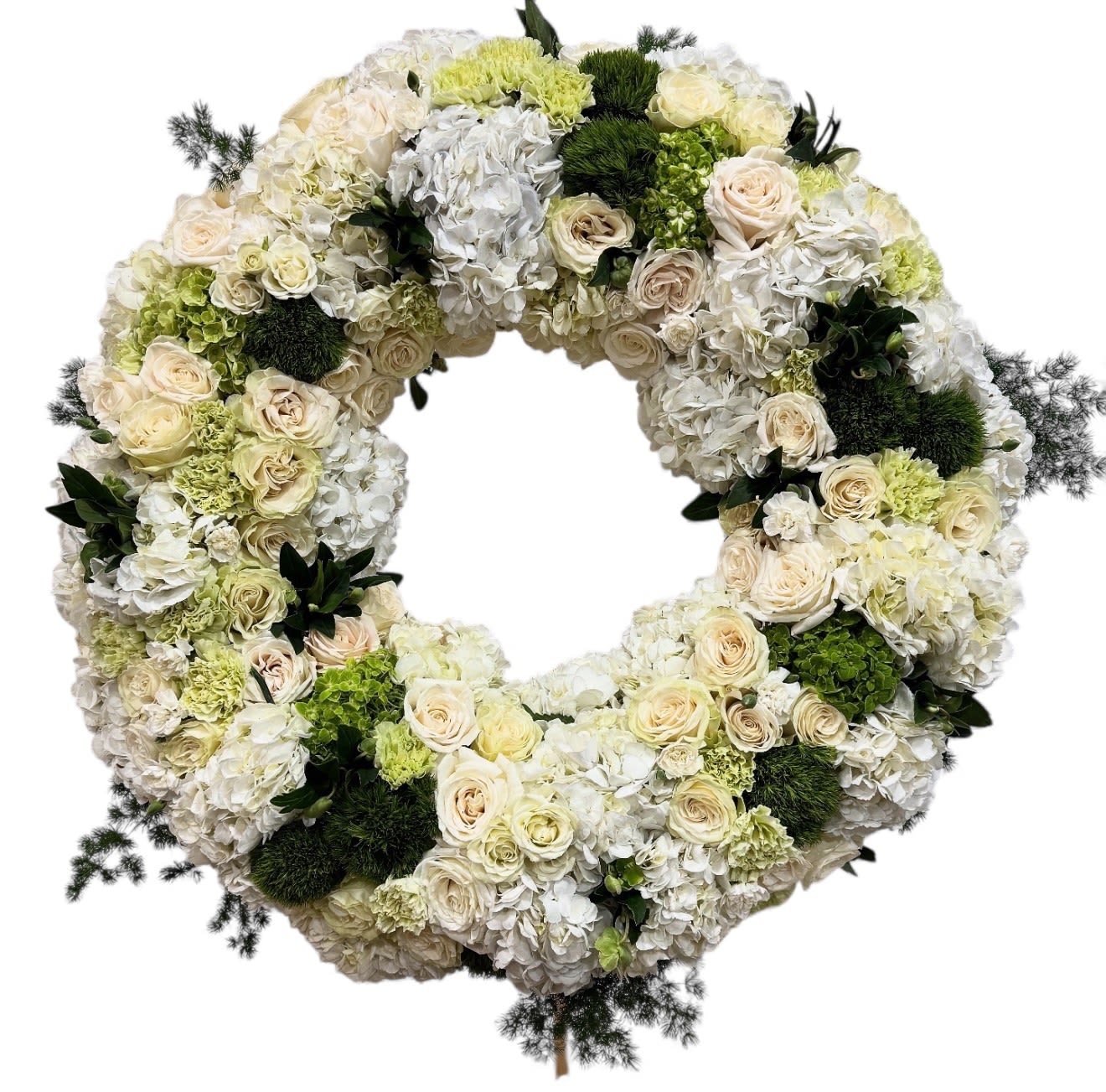 Circular wreath of white and cream flowers with green accents