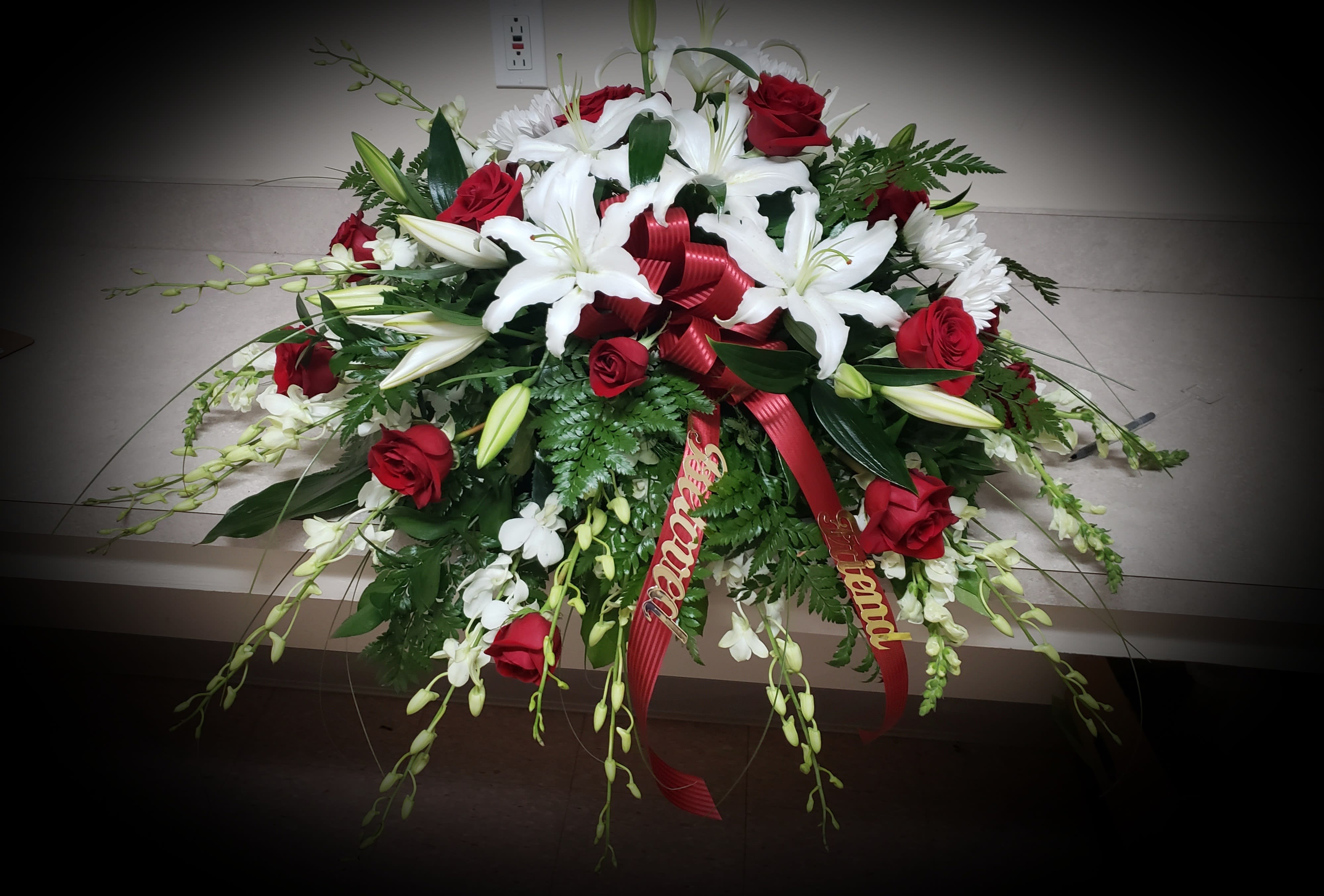 Red &amp; White Elegance by The Potted Plant - A beautiful display of love with white lilies, red roses and white orchids. What better way to show your love for your loved one.