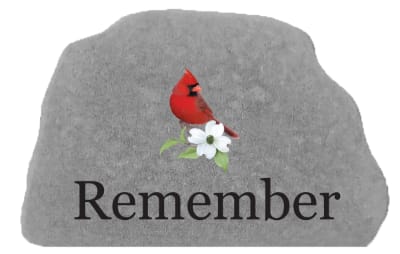 Gray memorial stone with a red cardinal and white flower above the word Remember