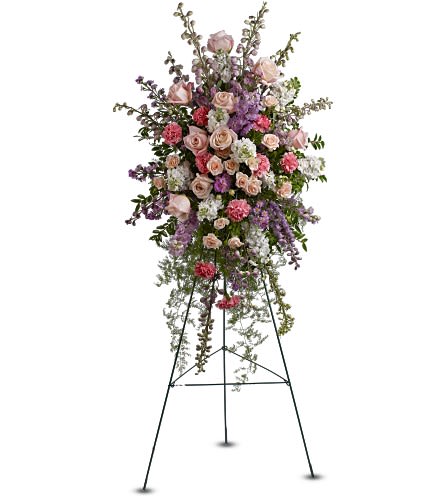 Peaceful Garden Spray - Celebrate a life of peace and harmony with a dramatic display of mixed fresh flowers. This grand standing spray of roses carnations delphinium and more can be hand-delivered directly to a funeral home or memorial service. A standing spray of fresh flowers such as roses carnations delphinium Monte Cassino asters and stock
