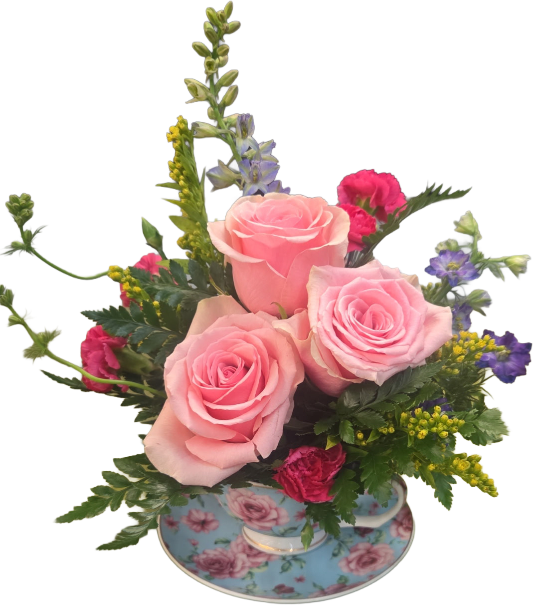 Garden Tea - Three large pink roses sit tucked into a floral teacup and matching saucer, making this flower arrangement feel like a little vintage tea party for the person you're celebrating. Perfect as a birthday bouquet, thank-you gift, or a just-because surprise, this garden-style arrangement reads feminine and cheerful-she'll feel noticed and cherished when she receives it.