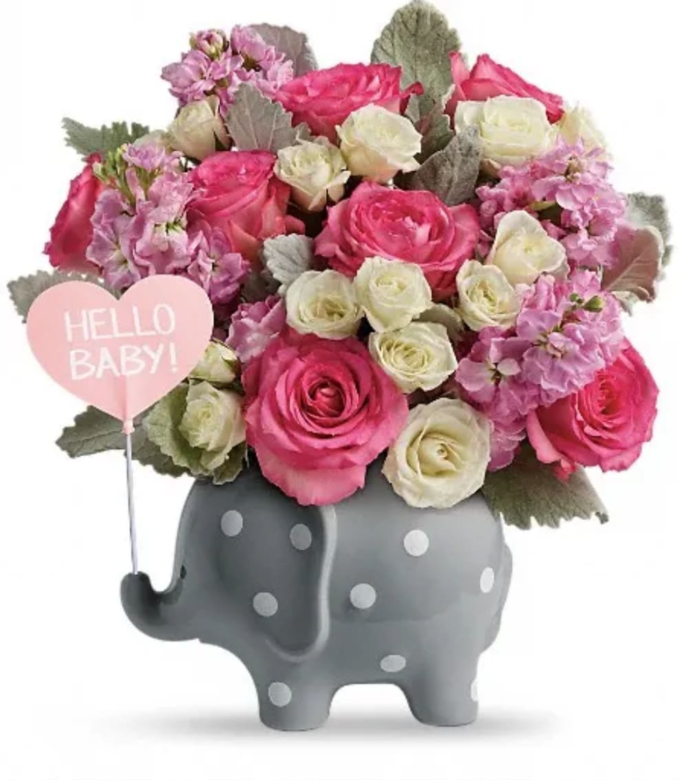 Pink and white rose bouquet in a gray elephant vase with a "Hello Baby!" heart pick