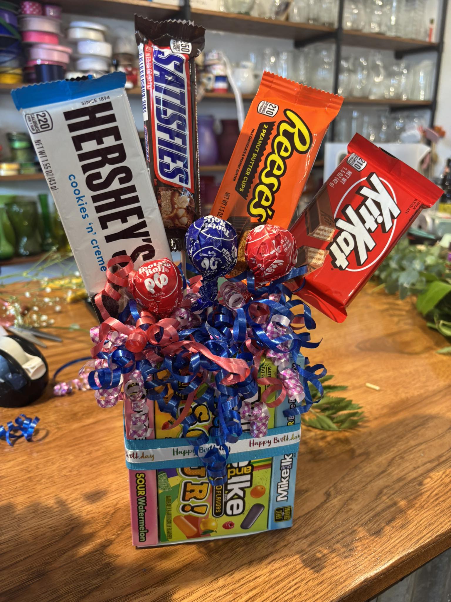 Candy bouquet with Hershey's, Snickers, Reese's, and Kit Kat bars