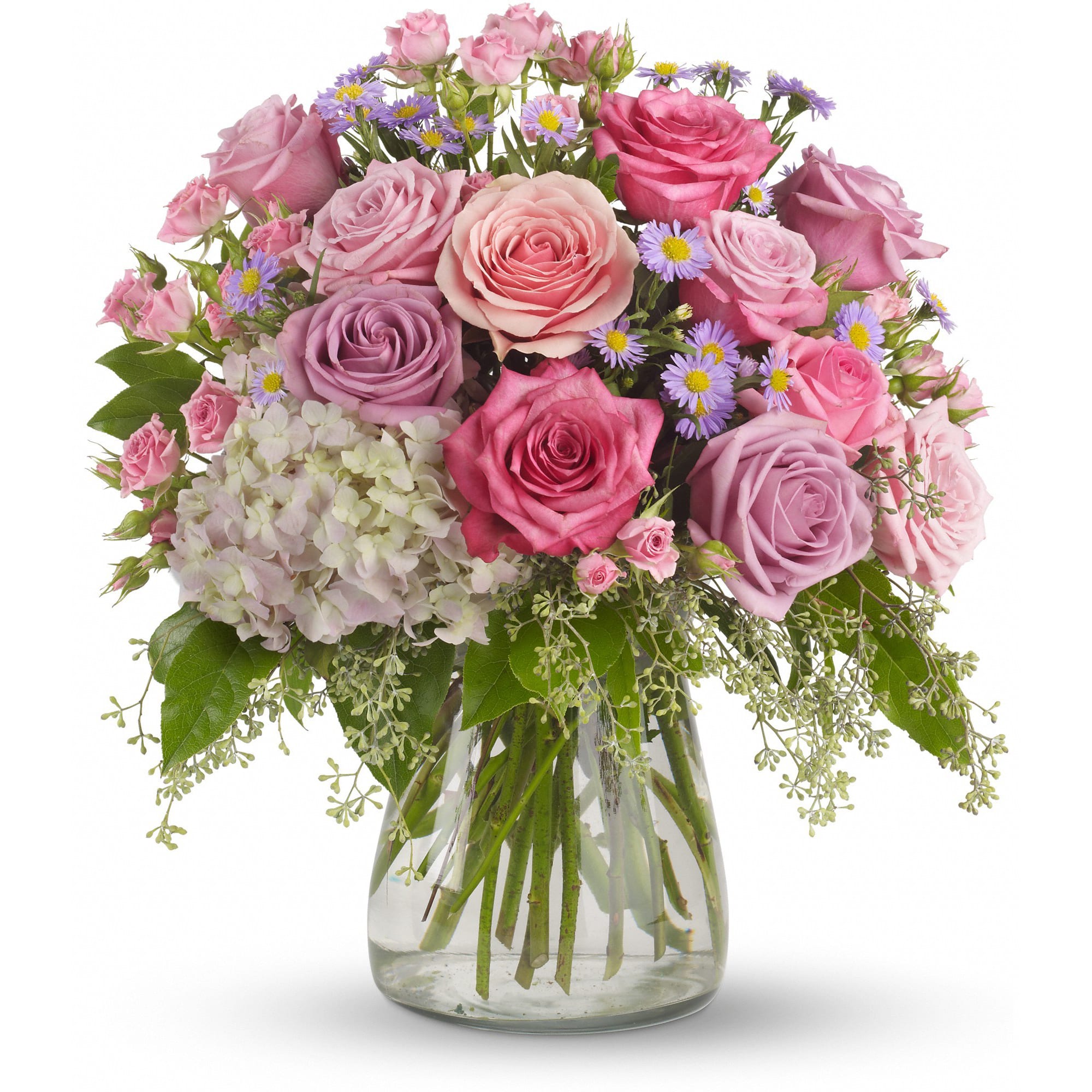 Pink and lavender roses with small purple daisies in a glass vase