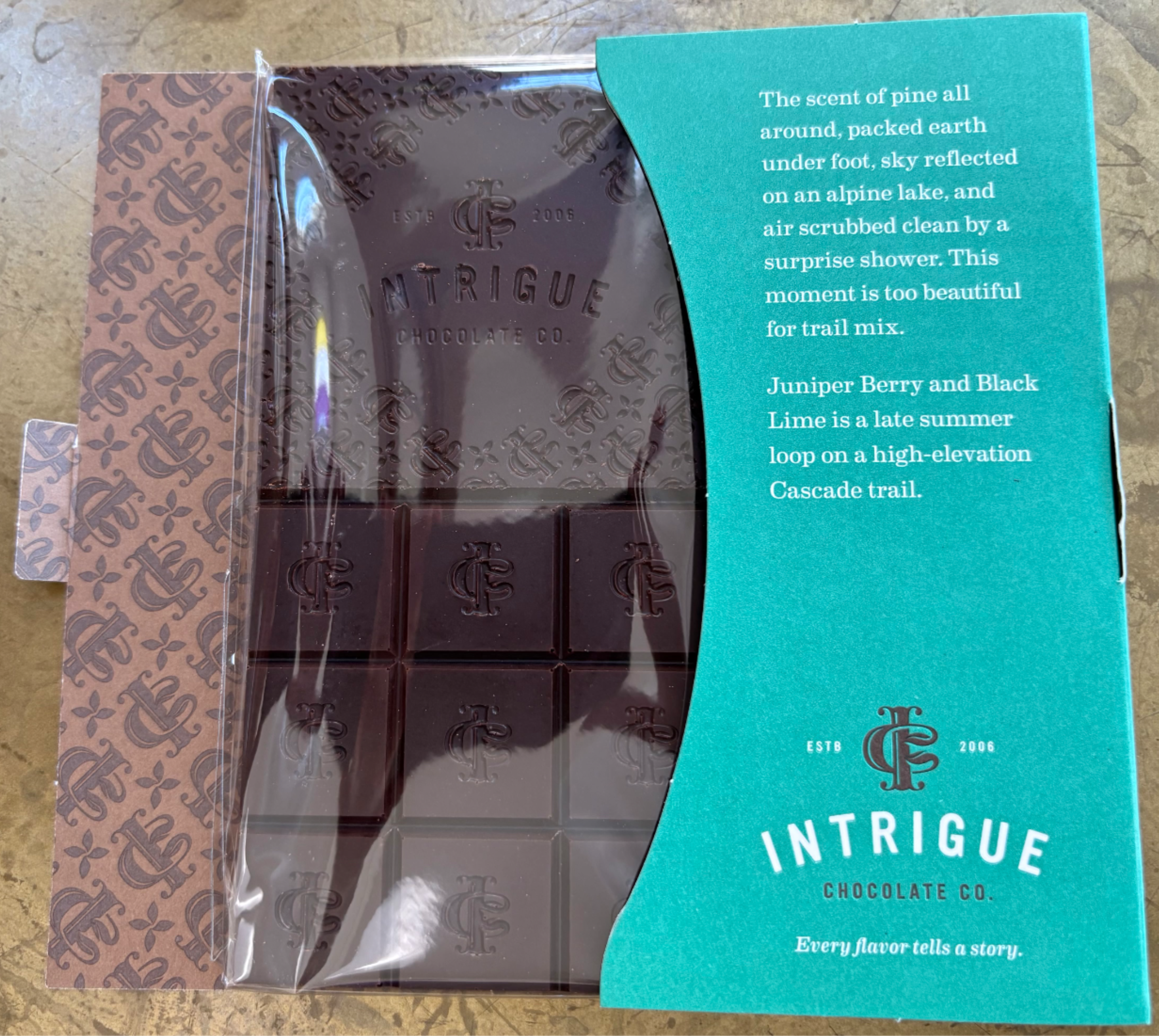 Intrigue Chocolate Co. Juniper Berry &amp; Black Lime Chocolate Bar - This creamy, delectable chocolate melts in your mouth, and takes your tastebuds on a wondrous journey. Life is meant to wander.  68% Cacao. 2.5 oz.