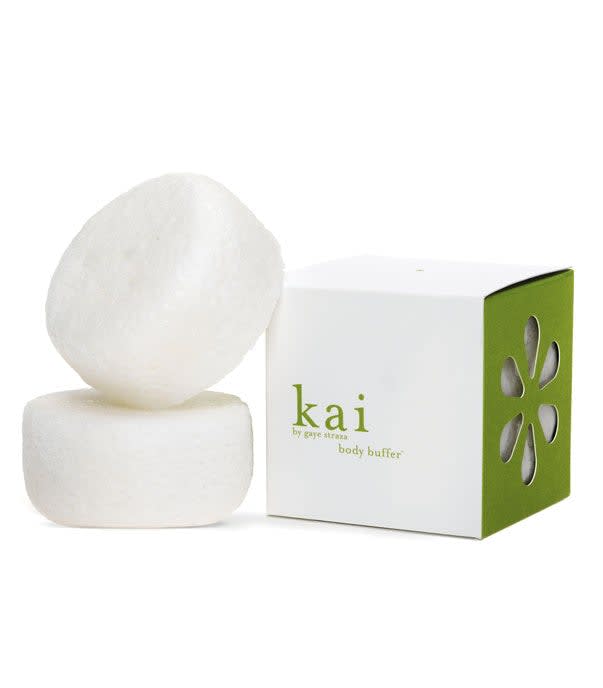 Two white bath bars beside a green-and-white box