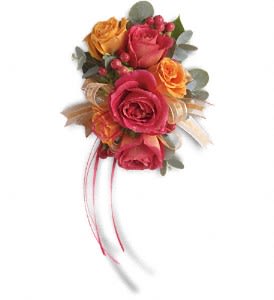 Sunset Beauty Wristlet - Warm orange and pink roses evoke the splendor of sunset.  Hot pink and orange spray roses mingle with red hypericum and accents of Israeli ruscus and eucalyptus.  Approximately 5" W x 7 1/2" H  Orientation: N/A