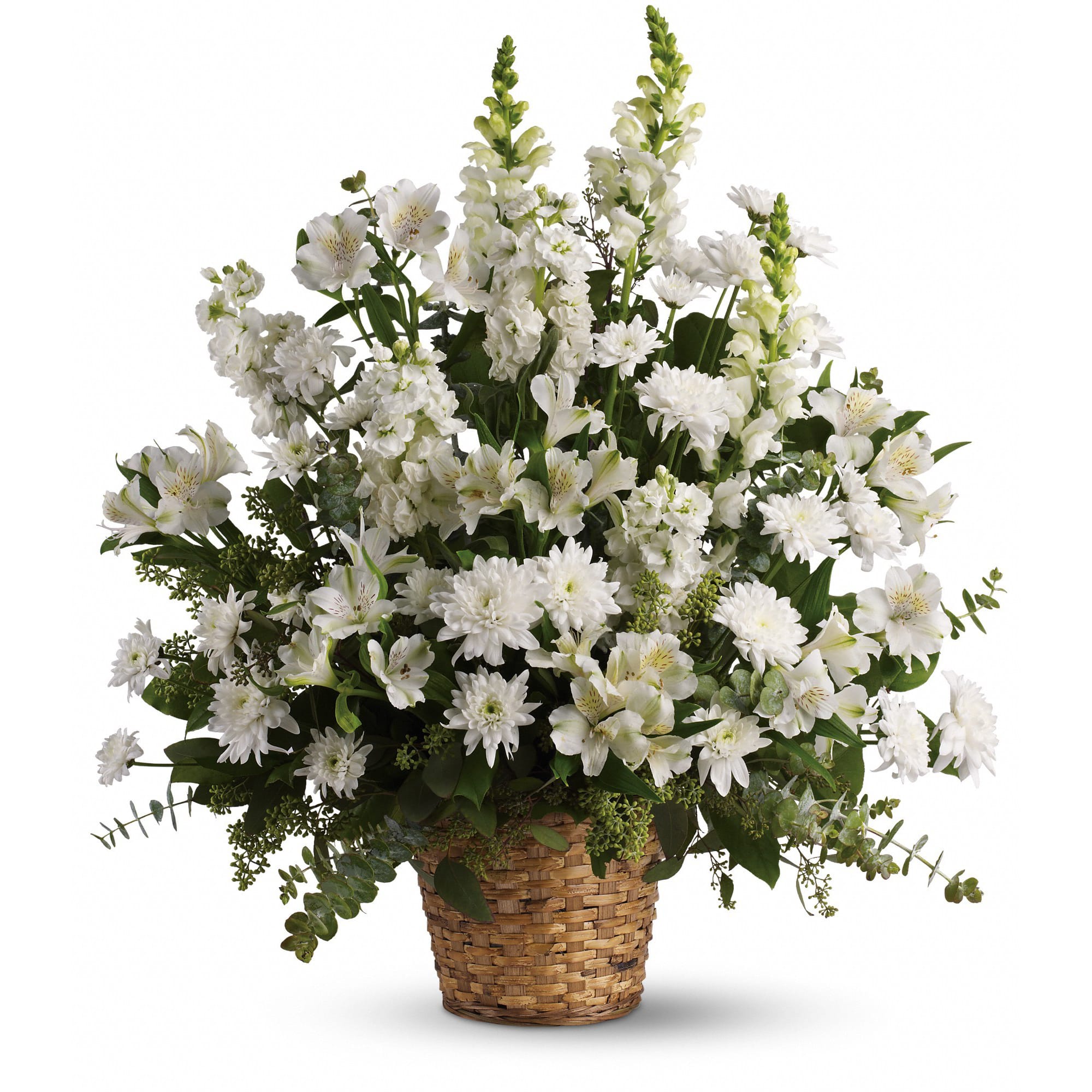 White mixed flower arrangement in a woven basket