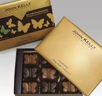 Gold box of butterfly-shaped assorted chocolates with branded lid