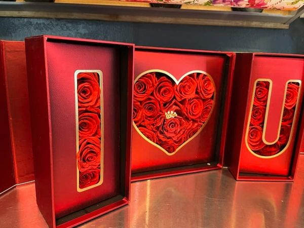 Red rose box set spelling I heart U with roses packed inside red rectangular frames