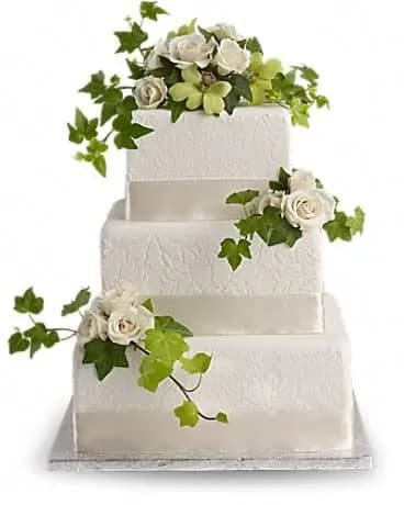 Roses and Ivy Cake Decoration - A classic combo of cloud-white roses and fresh green ivy. White spray roses, green dendrobium and ivy accents. 