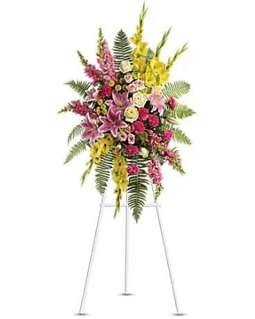 Rays of Light Spray - This stunning spray is a beautiful and touching display of your sympathy and devotion. A lovely composition of flowers such as green roses, gladioli and button spray chrysanthemums, pink spray roses and carnations, light pink oriental lilies and snapdragons are arranged with a mix of beautiful greenery in a standing spray of flowers that's delivered on an easel. 