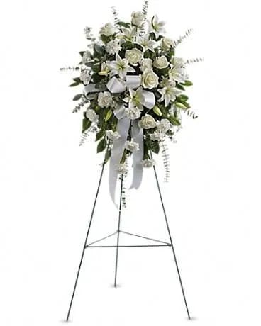 Sentiments of Serenity Spray - Beautifully simple, this lovely spray of white roses, lilies and carnations decorated with white satin ribbon is a tasteful way to express your sympathy. The elegant spray includes white roses, white Asiatic lilies and white carnations, accented with assorted greenery. 