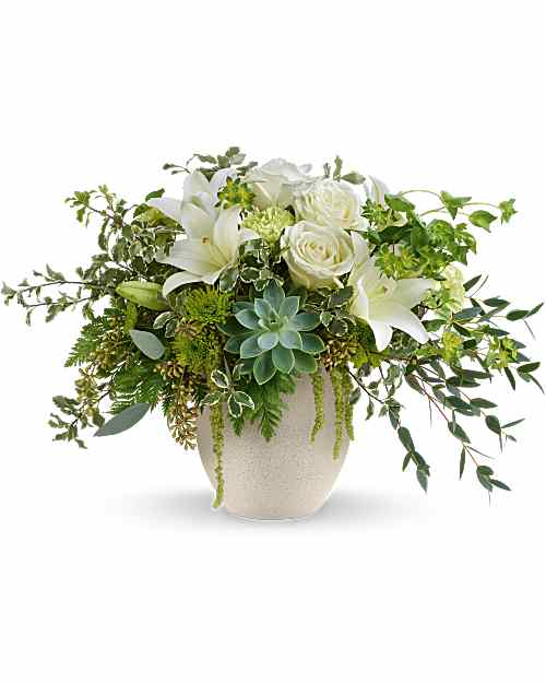 Cloud Petals Bouquet - Celebrate Dad with the Cloud Petals Bouquet, a fresh mix of white blooms and lush greenery arranged in a Modern Stone Bowl. With its faux concrete speckled look, this modern Father's Day arrangement adds clean, contemporary style. Cloud Petals Bouquet is a modern Father's Day floral arrangement featuring white roses and asiatic lilies, green carnations, green cushion spray chrysanthemums, and a green echeveria succulent, accented with hanging amaranthus, bupleurum, eucalyptus, leatherleaf fern, and pitta negra.   Approximately 21" W x 13 3/4" H