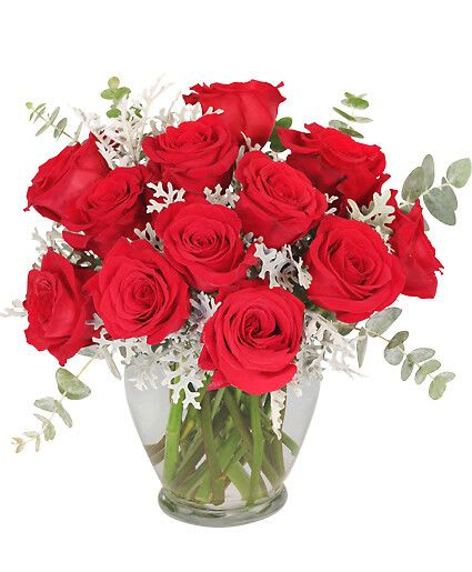 Guilty Pleasure - Indulge your loved one with something truly special on this day filled with love! The radiant red roses mix with the decadent baby blue eucalyptus to create a truly drop-dead gorgeous bouquet. Elegant and divine, you won't feel guilty about this pleasure!  Includes Clear Ginger Vase&amp;nbsp, Foliage: Dusty Miller, Baby Blue Eucalyptus&amp;nbsp, Red Roses.