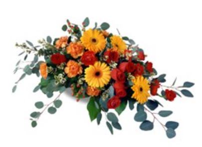 Mixed bouquet of yellow gerbera daisies and red-orange flowers