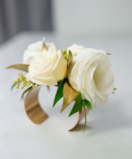 Choose Rose Color - Gold Cuff Corsage - Modern, sleek gold metal cuff makes a quietly glamorous wrist corsage.  ADD CHOICE OF ROSE COLOR IN NOTES RED, WHITE, PINK, CALL FOR OTHERS THAT MAY BE AVAILABLE.  RIBBON CAN ALSO BE ADDED VIA NOTES.  